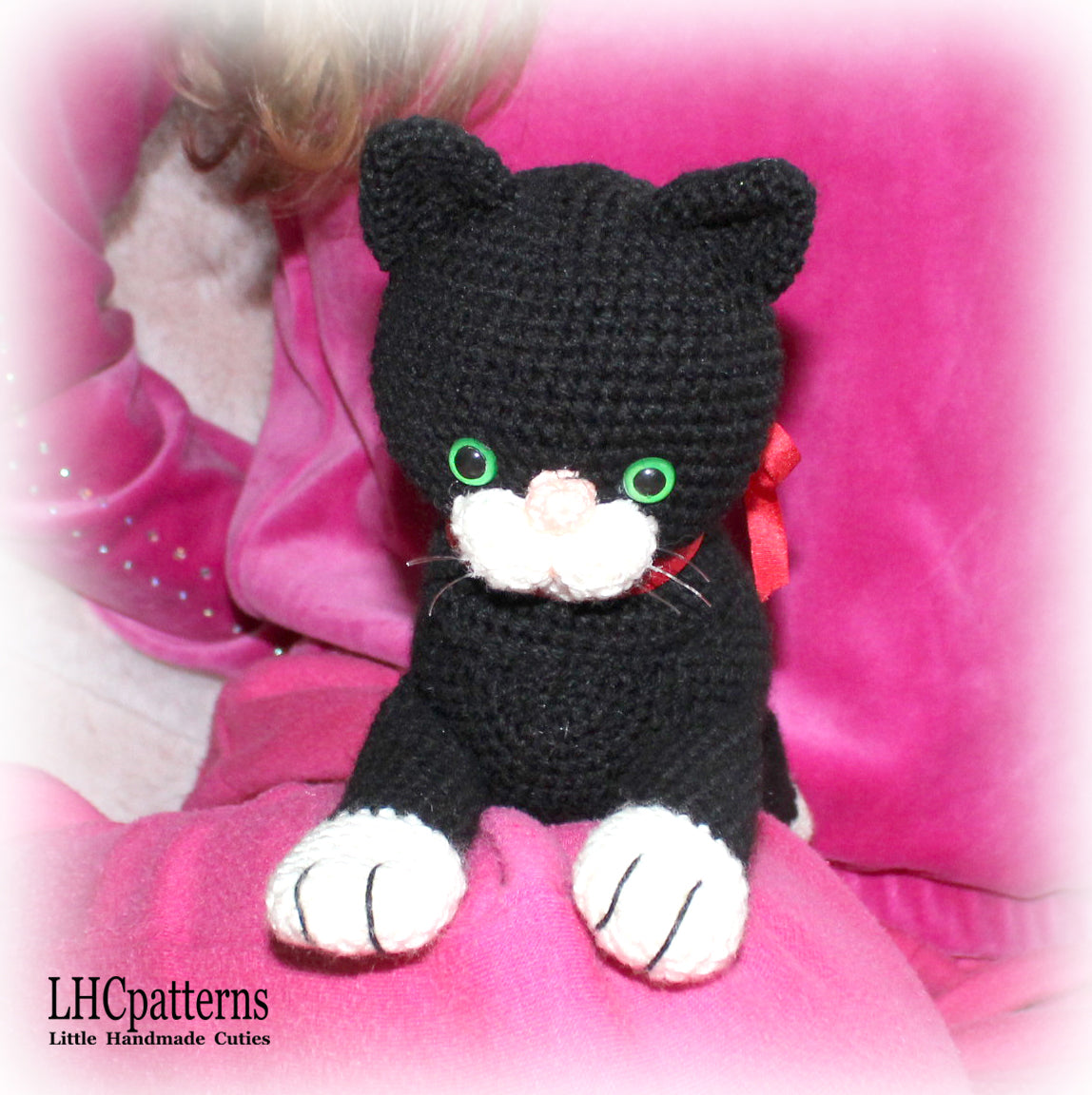 crochet black laying cat